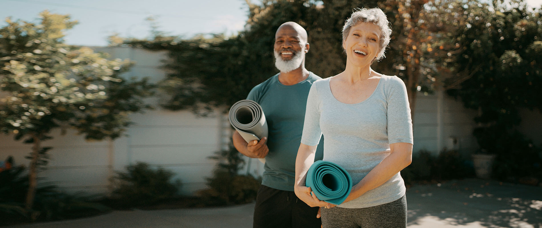 African American Man and Caucasian Woman Yoga